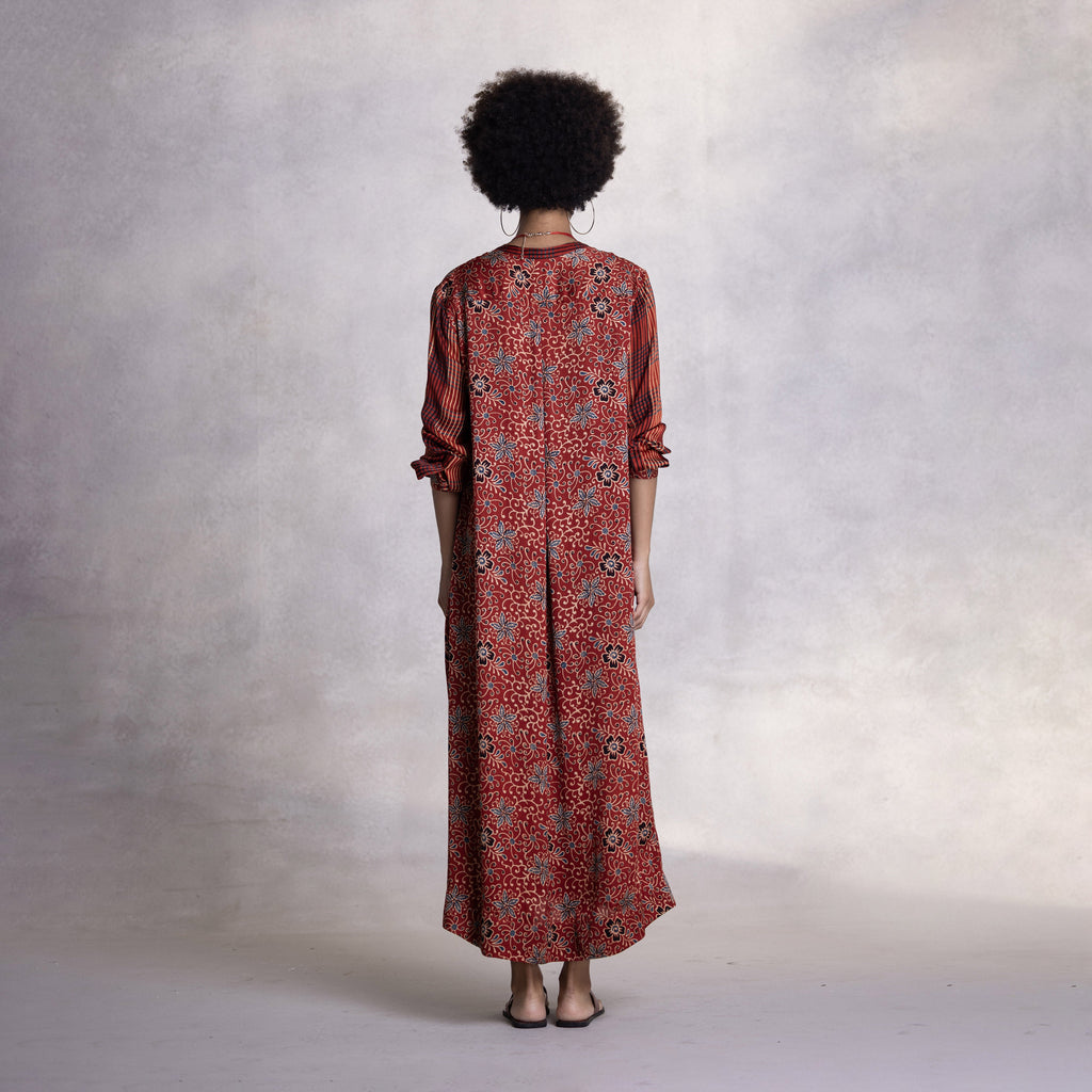Modal satin dress showing relaxed silhouette and fluid drape
